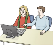 Zwei Menschen sitzen am Computer